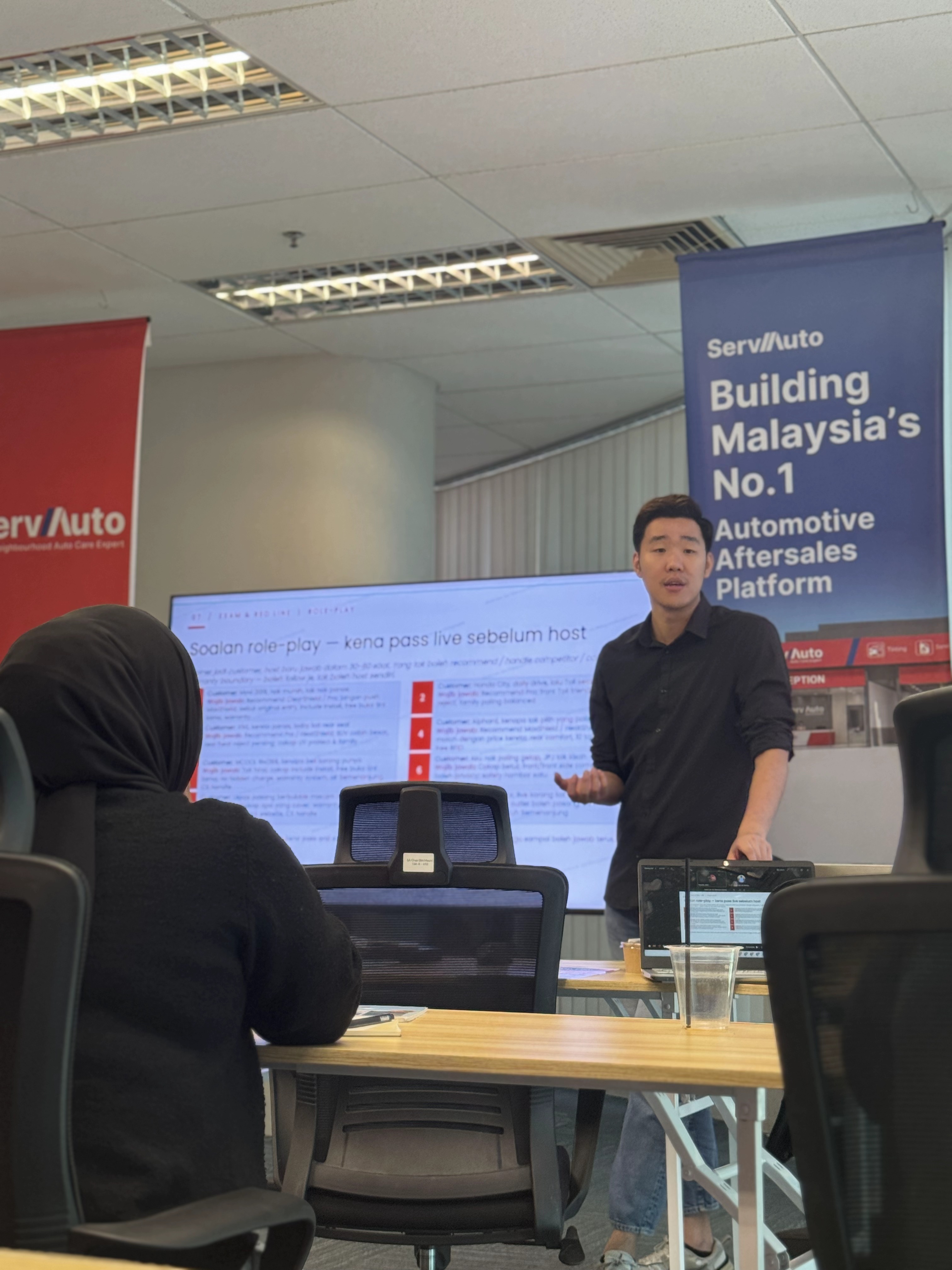 Trainer conducting role-play session